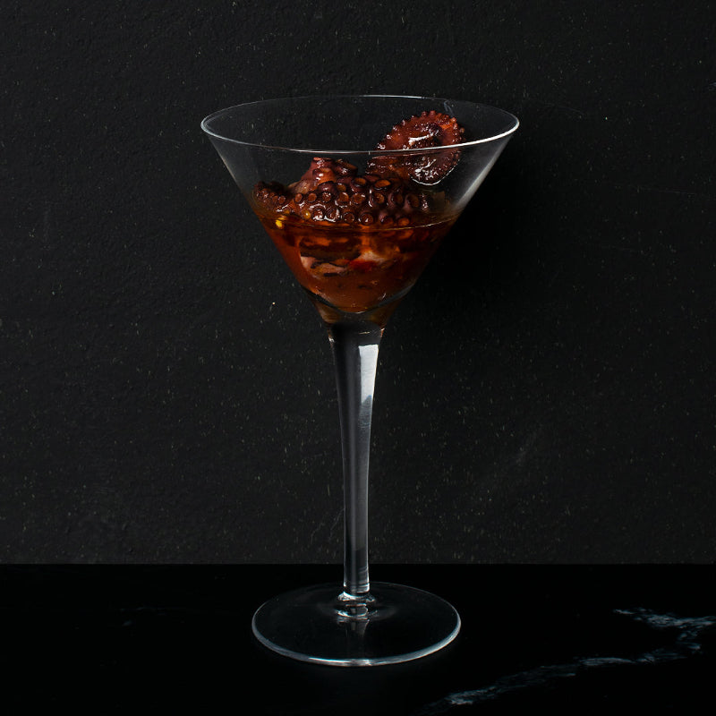 Ragoût de poulpe en conserve ABC+ servi dans un verre à cocktail