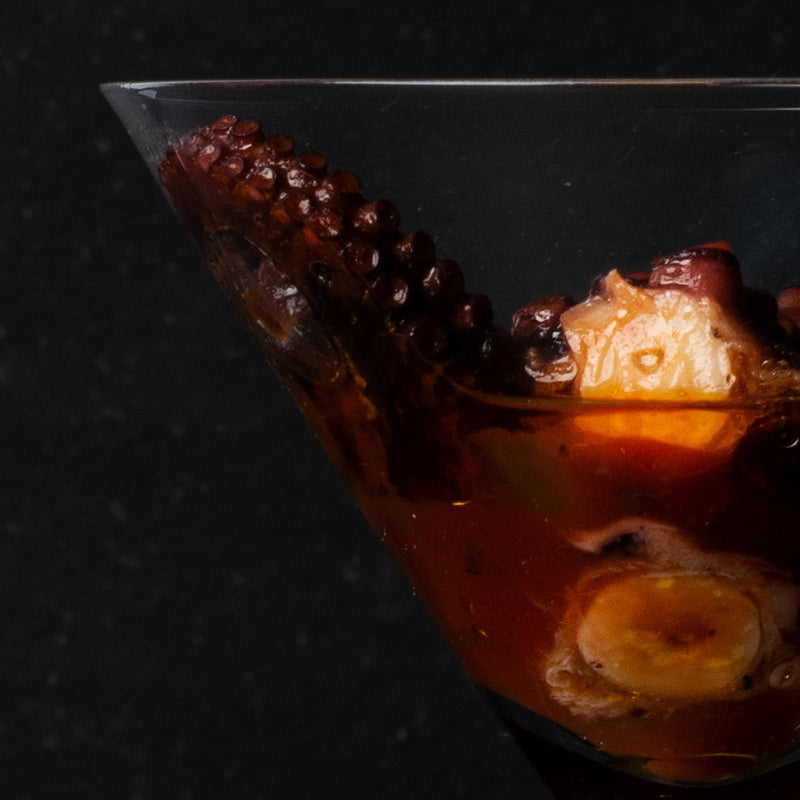 Ragoût de poulpe en conserve ABC+ servi dans un verre à cocktail
