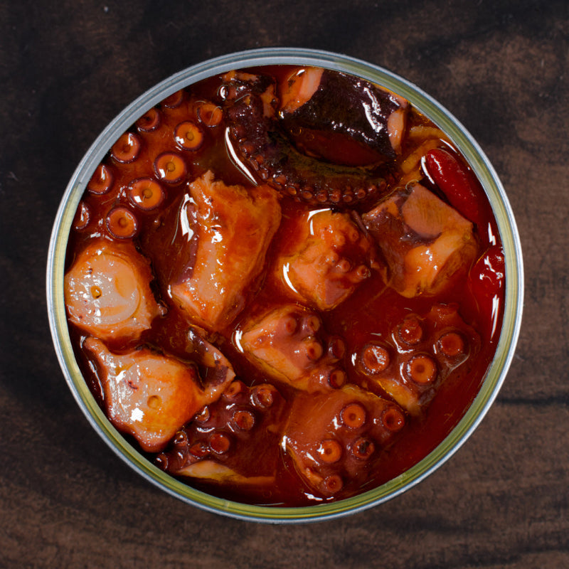 Ragoût de poulpe en conserve ABC+ boîte ouverte sur la table