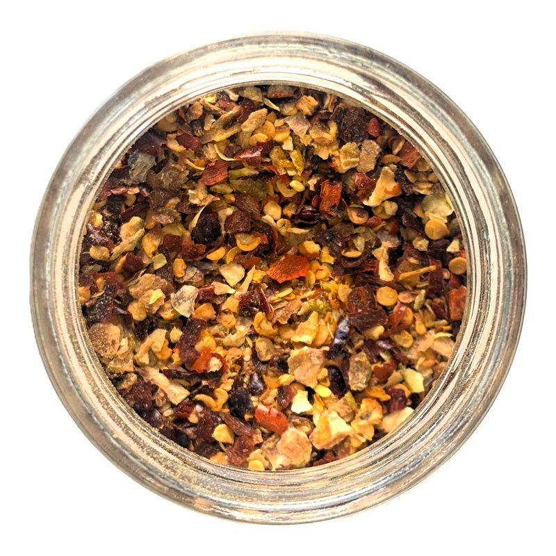 Mélange d’épices piment et citron boîte ouverte